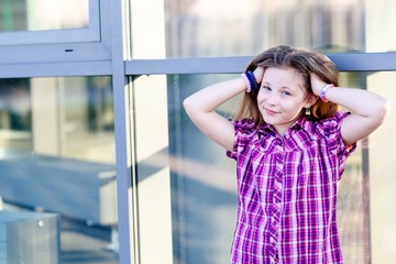 Portrait of happy blond hair ten years girl