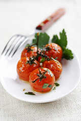 cooked tomatoes on the vine