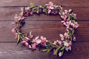 Note, postcard, writing of peach tree flowers on a wooden vintage table
