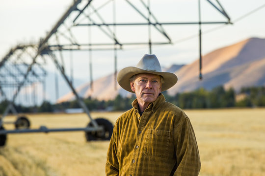 Male farmer standing in field