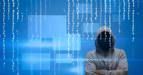 Digital composite image of hacker standing arms crossed