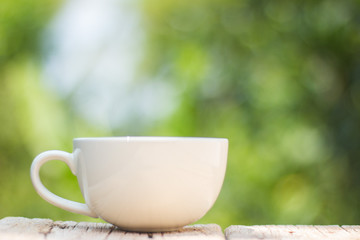 A cup of coffee on a wooden