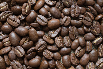 Roasted coffee beans close-up top view