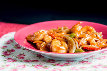 wok fried chicken stir fry with sweet peppers and chinese vegetables