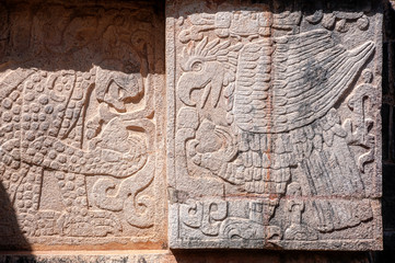 Mayan Symbols Carvings on the platform of the Eagles and Jaguars at Chichen Itza, Mexico
