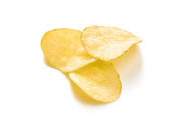 Fototapeta na wymiar Crispy potato chips isolated on white background close-up