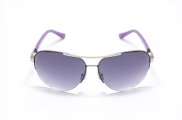Sunglasses with purple glass in an iron frame isolated on white
