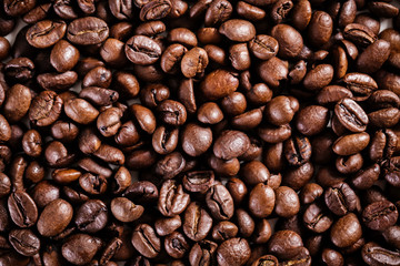 roasted coffee beans background. brown texture