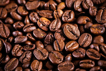 roasted coffee beans background. brown texture
