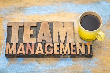 team management banner in letterpress wood type