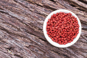 Seeds of achiote, originating from central america and parts of south america is used to season and color food