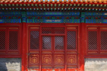 Gateway with red Chinese doors