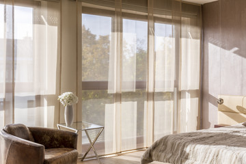 Sunny bedroom with marital bed