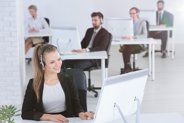 Call center agent with colleagues