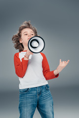 Fototapeta premium Boy using loudspeaker