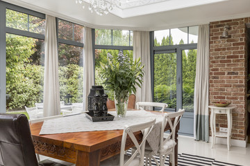 Dining area surrounded by windows