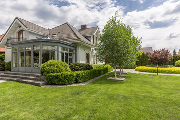 House surrounded by garden