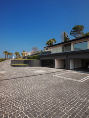 Exterior view of a modern luxury villa, courtyard