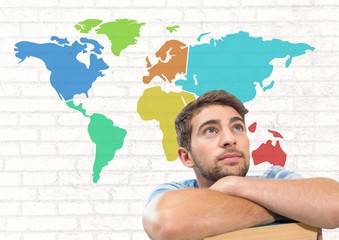 Businessman looking up with Colorful Map with wall background