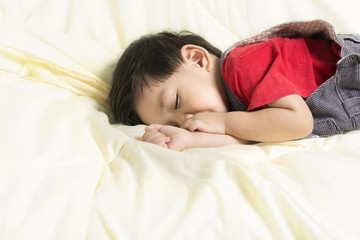 Baby Boy Sleep and Suck finger on bed.