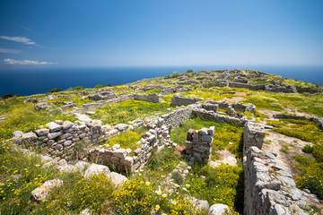 The ruins of ancient Thira, a prehistoric village at the top of the mountain Mesa Vouno, Santorini,...