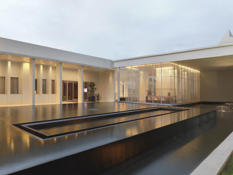 Infinity pool in front of modern home