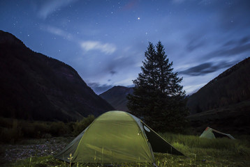 Tent under the stars in the mountains