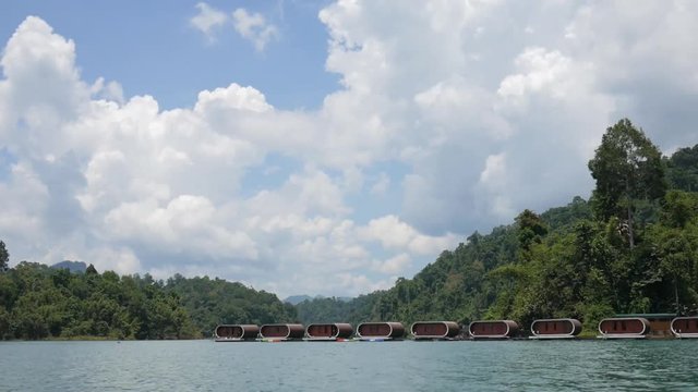 Cheow Lan Lake Houses View From Boat , Khao Sok National Park in southern Thailand. HD Slowmotion.