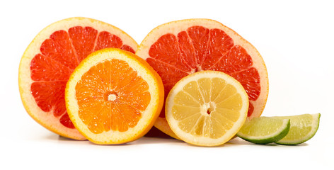 Isolated Citrus Fruits. Slices of Lemon, Orange, Lime and Grapefruit. Isolated on White Background With Clipping Path.