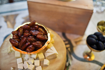 Cheese and berries stand served on the wooden box