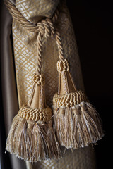 Curtain decorated with brown rope