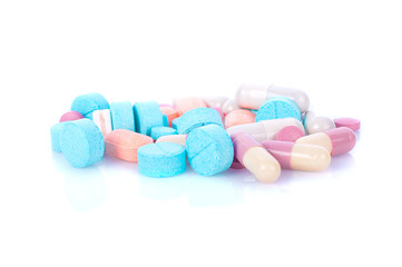 Herbal drugs capsules isolated on white..