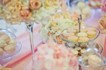 Tired glass dish with different kinds of macaroons