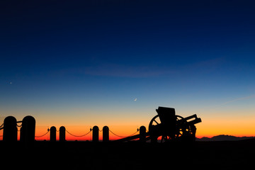 Cannon silhouette at twilight