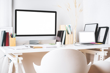 Contemporary workplace with white devices