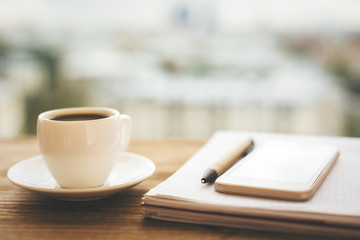 Wooden table with coffee