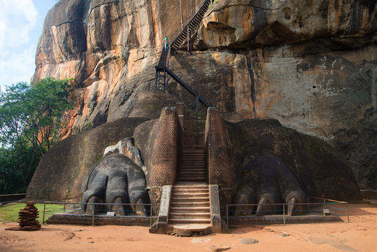 Two ancient lion's paws at the beginning of the ascent to the top of the mountain. Entrance to the upper part of the royal palace. Sigiriya, Sri Lanka