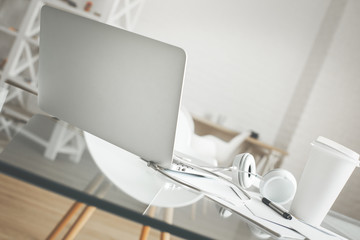 Desktop with coffee and headphones