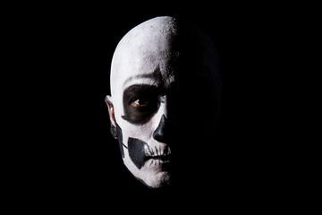 Naklejka premium Beautiful man with creative make-up for the Halloween party
