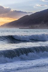 Beautiful stormy seascape at sunset time