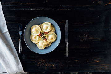 ravioli with ricotta cheese, yolks quail eggs and spinach with spices.