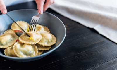 ravioli with ricotta cheese, yolks quail eggs and spinach with spices.