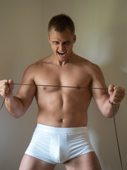 Fototapeta premium Powerful athletic man with great body