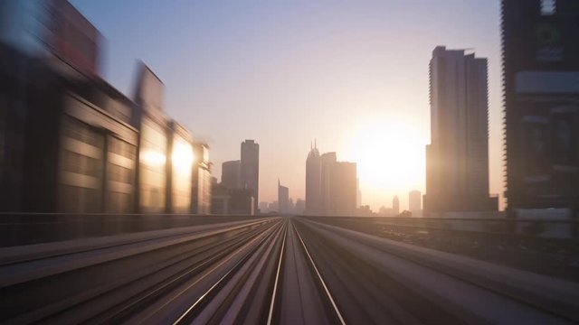 sunset light dubai famous metro line marina district ride panorama 4k time lapse uae
