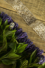 Bouquet of flowers on a wooden background 3