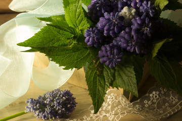 Bouquet of flowers on a wooden background