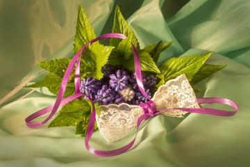 Bouquet of lilac flowers and lace bow 3