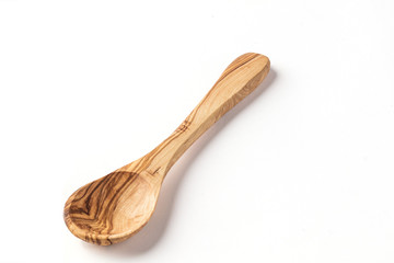 Isolated wooden mixing spoon on a white background
