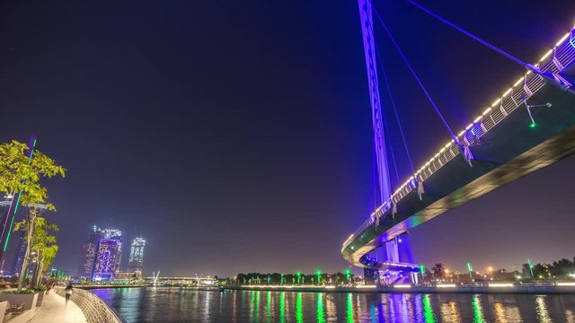 night illumination dubai city famous water canal bridge panorama 4k time lapse uae
