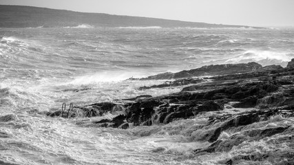Rough sea in black and white.